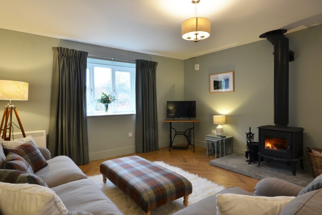 Open plan living room at Porter's Lodge - Dunrobin Holiday Cottages, Caithness